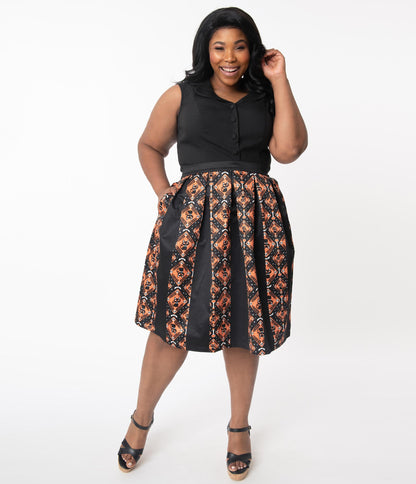 This is a Unique Vintage Halloween swing skirt that has black cats, bats and skulls with orange print and the model is wearing a plus sized black shirt.